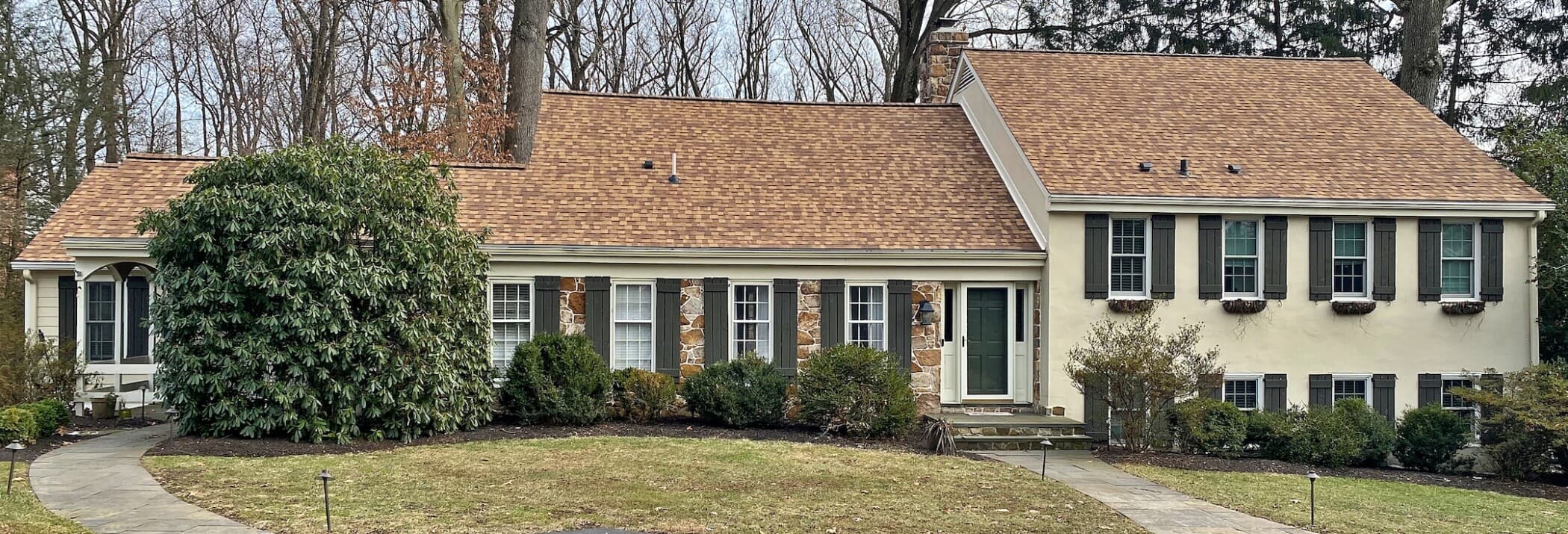 New asphalt shingle roof on suburban home completed by O'Donnell Roofing