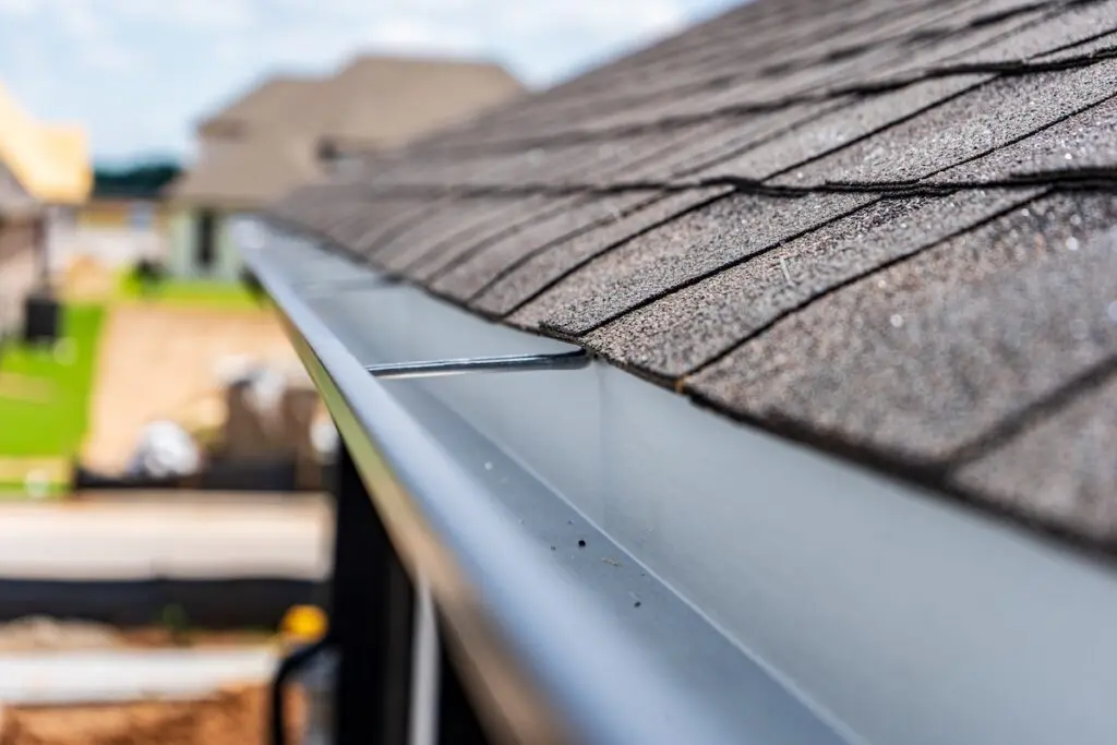 Professional gutter installation on a home in Devon, PA