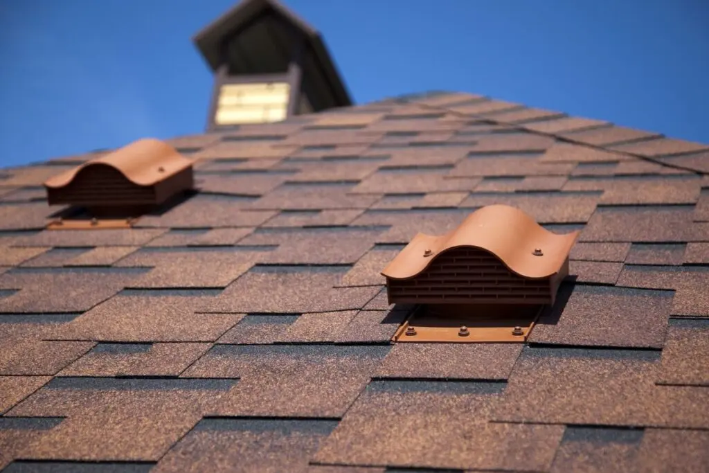 roof vent installation brown shingles roof