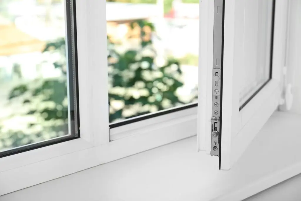 an open white window and an empty white windowsill