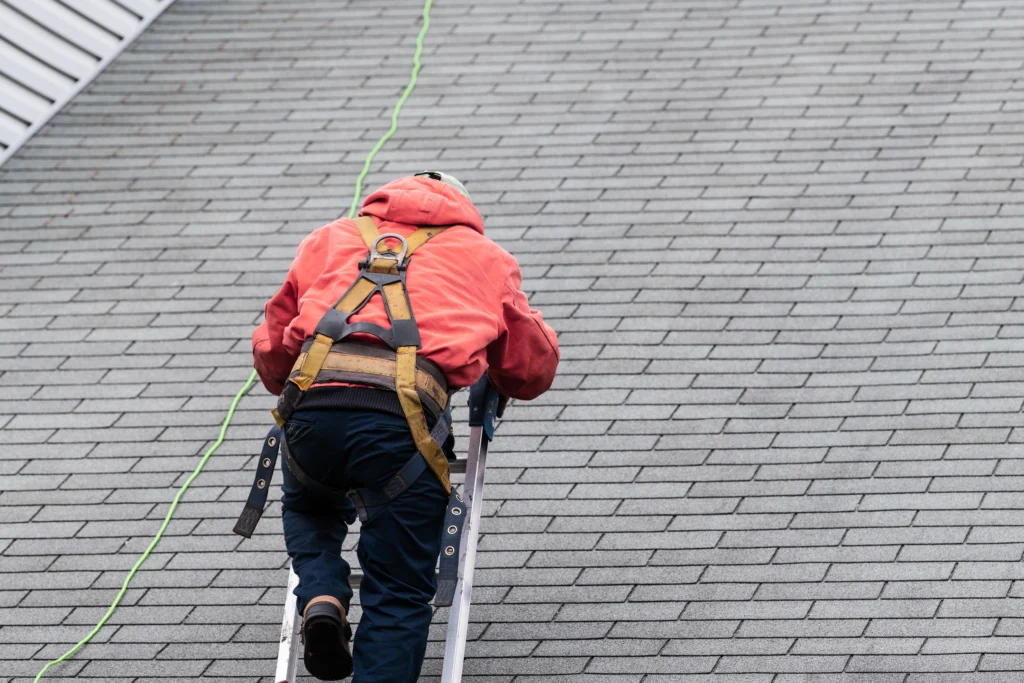 contractor inspects roofing