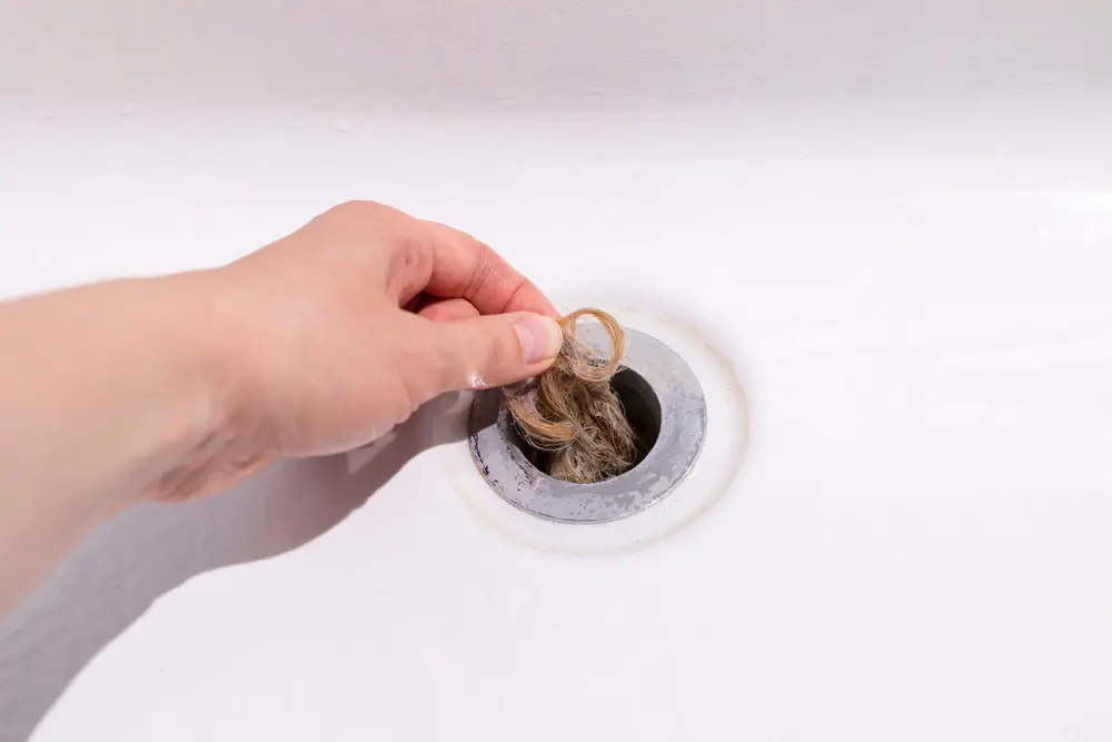 clogged drain (clogged with fur balls)