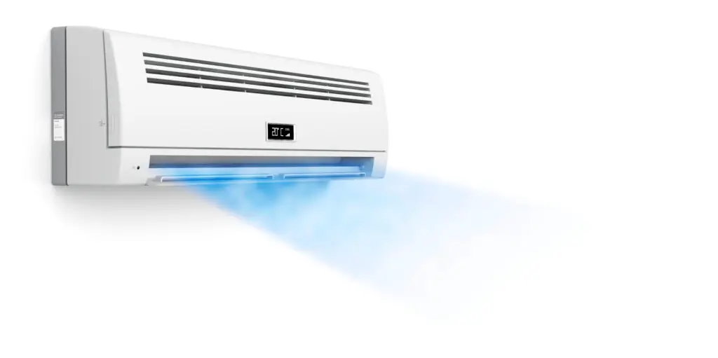 Ductless mini-split indoor unit mounted high on a living room wall