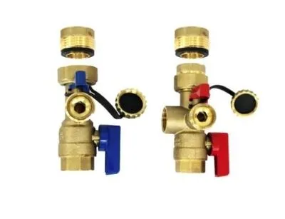 Brass check valves with red and blue handles, used in water heater systems for sediment management and maintenance.