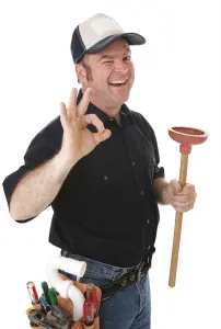 Smiling plumber holding a plunger and signaling "OK," representing professional plumbing services and inspections for homeowners.
