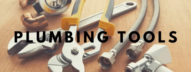 Plumbing tools including adjustable wrenches and hoses for repair tasks by Allore's Plumbing Services LLC.