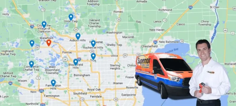 Map of Oakland County service area with highlighted locations and Superior Plumbing, Heating & Air-Conditioning van and technician.