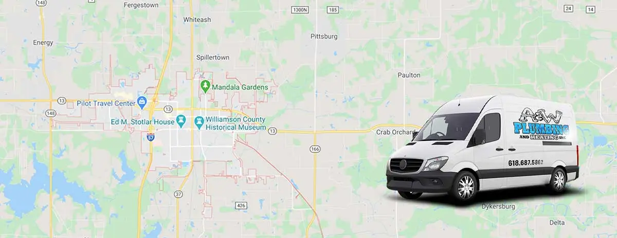 A & W Plumbing and Heating service van positioned on a map of Marion, Illinois, highlighting the company's service area for plumbing and heating solutions.