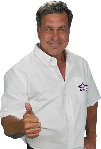 Smiling technician in a white shirt giving a thumbs up, representing Boutwell's Air Masters HVAC services.