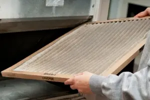 Dirty Air Filter Being Changed