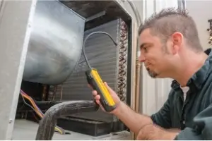 Technician Inspecting Heater