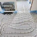 Flexible piping network on a grid floor, showcasing A-Plus Air Conditioning's in-floor radiant heating system installation.