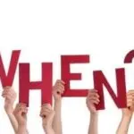 Hands holding large red letters spelling "WHEN?" to emphasize urgent AC repairs by Atlantic Heating & Air Conditioning.