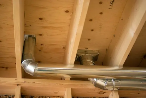 Metal ductwork installed in a residential ceiling, showcasing air circulation system crucial for HVAC efficiency and indoor air quality.