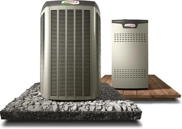 Lennox heating and cooling systems displayed on a gravel and wooden platform, emphasizing energy-efficient furnace options for homeowners in Spring, TX.