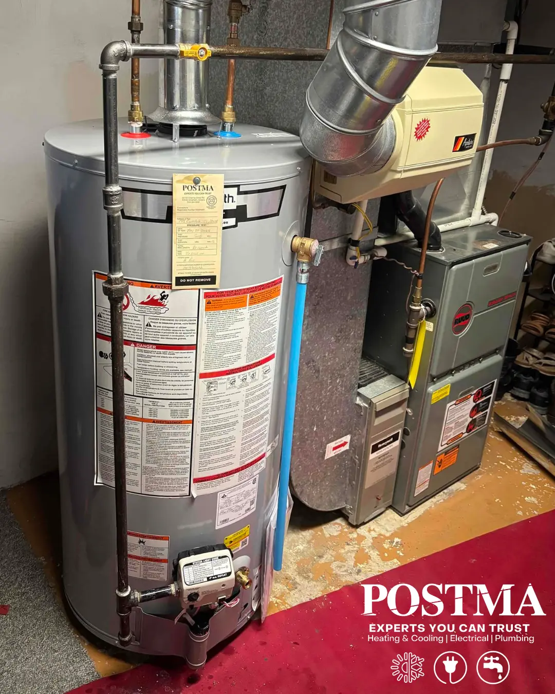 Completed hot water heater replacement at a residential home, installed by Postma.