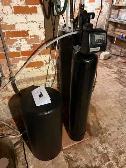 Residential water softener system installed in basement in Chatham-Kent, Ontario