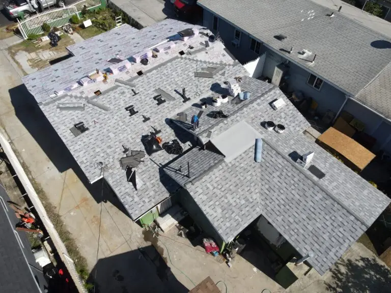 roofing long beach ca workers replacing roof