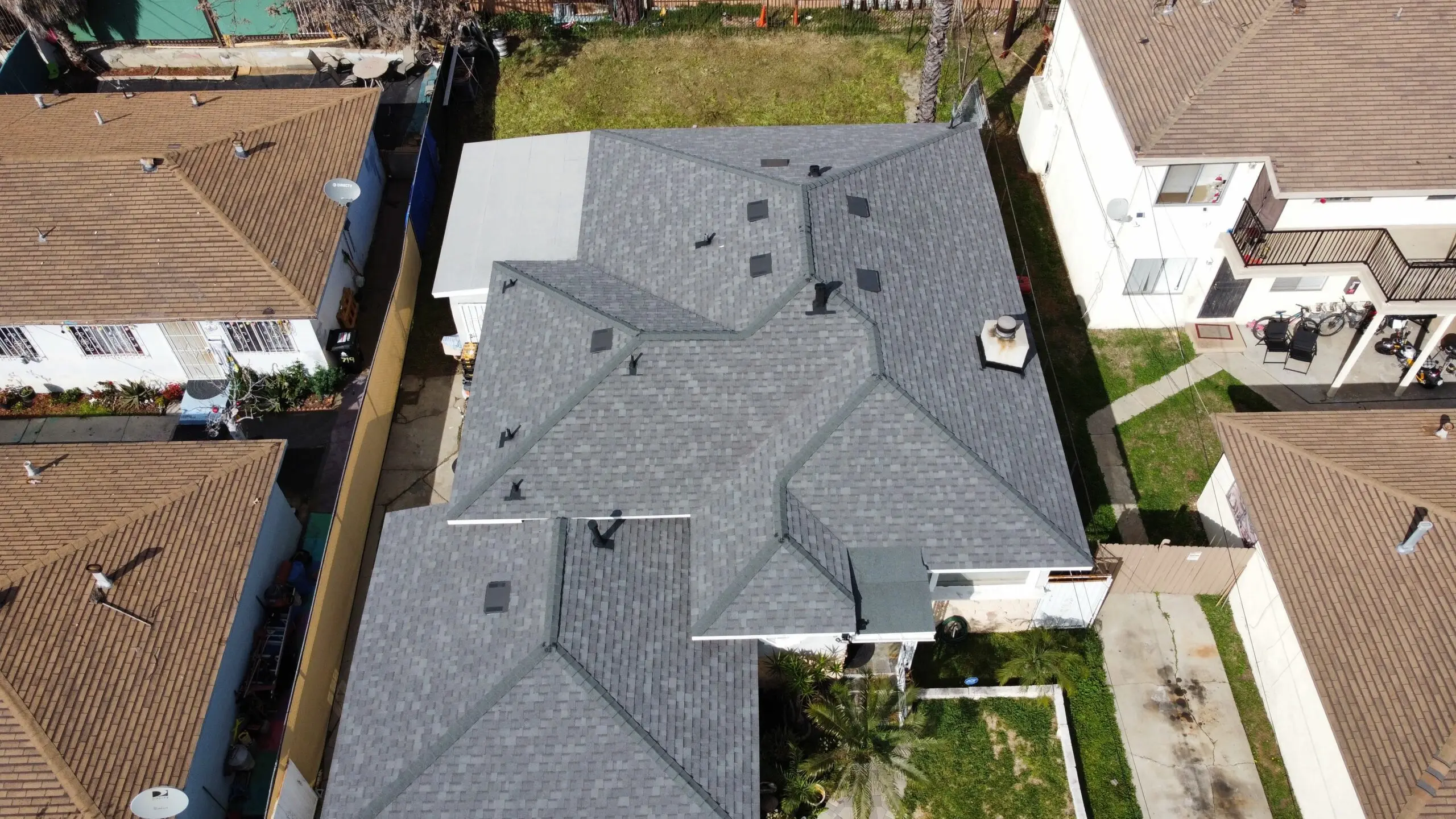 Aerial view of a grey shingle roof