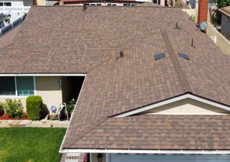 Aerial view of a roof with a new shingle roof