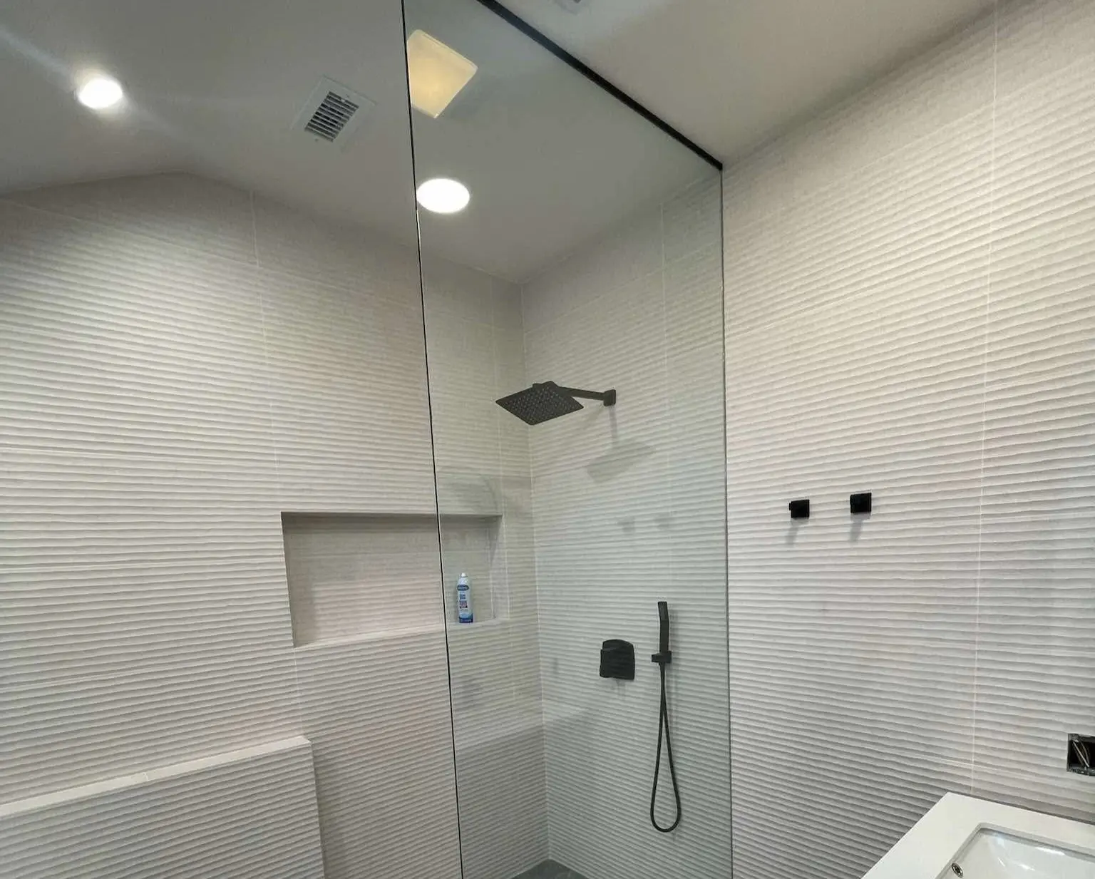 A shower with black details
