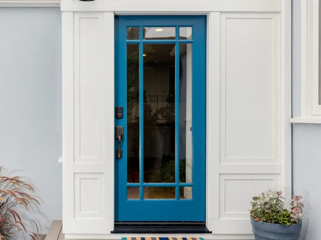 fiber glass door blue door white wall
