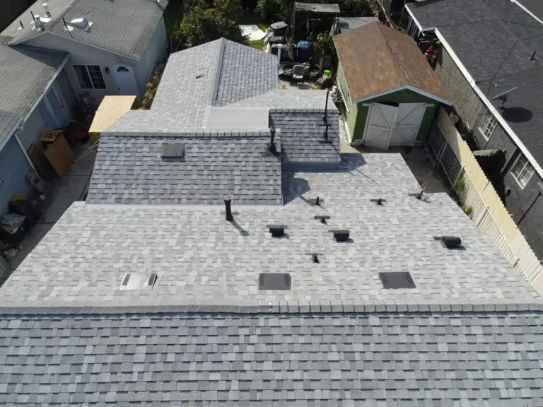 Residential Roofing in Redondo Beach, CA grey shingles roof small house grey shingles aerial view