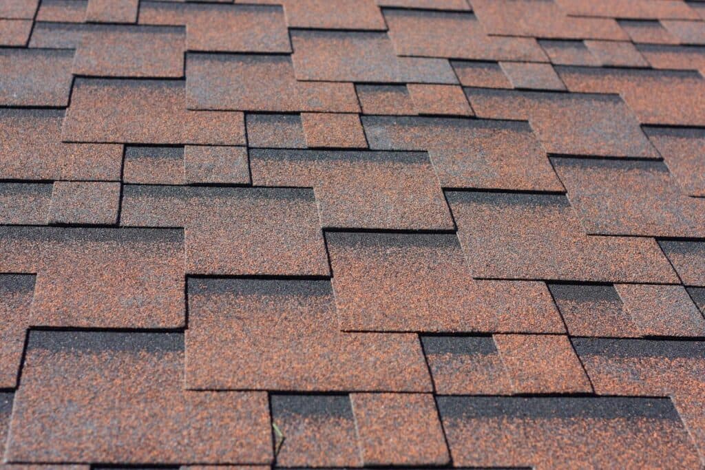 close-up of brown and tan asphalt shingles