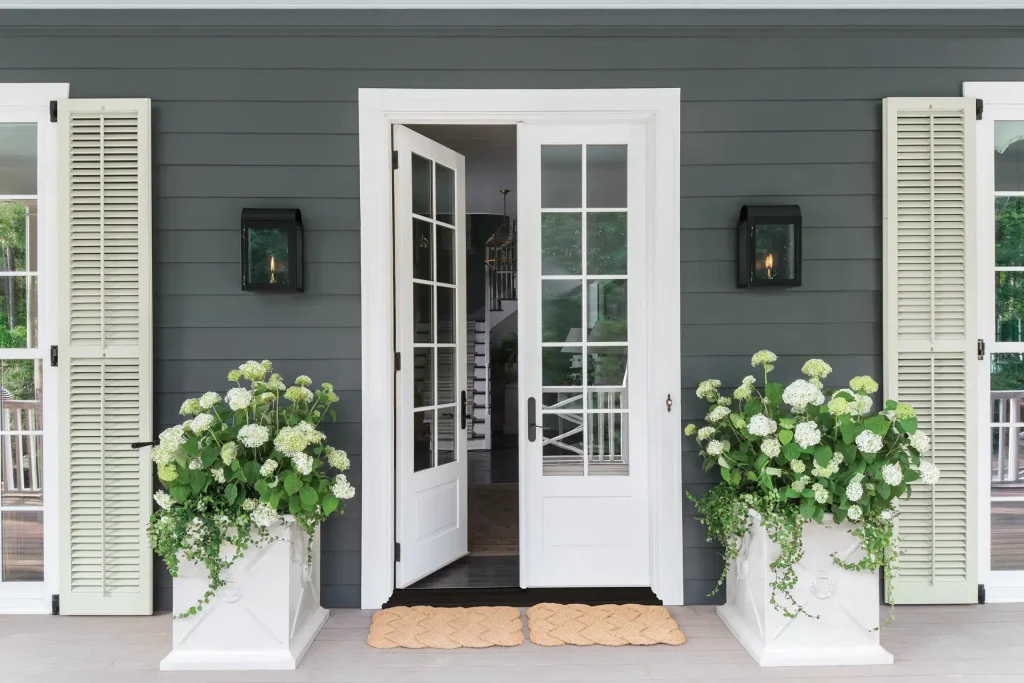 fiber glass door white door blue siding