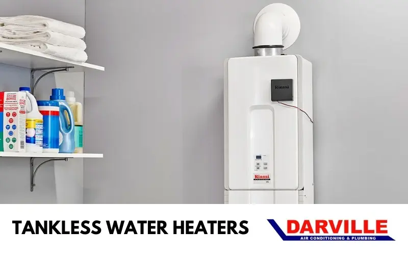 Tankless water heater mounted on a wall, featuring Rinnai branding, alongside shelves with towels and cleaning supplies, relevant to Darville Company's plumbing and HVAC services.