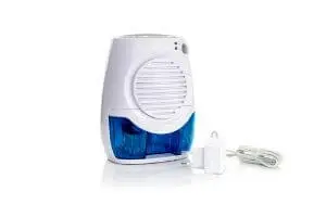 Dehumidifier unit with a blue water collection tank, illustrating solutions for reducing humidity and improving indoor air quality.