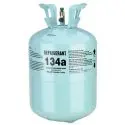 Light blue refrigerant gas cylinder with label indicating Refrigerant 134a at Chad's AC Direct HVAC services.