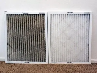 Dirty and clean air filters side by side, illustrating the importance of regular air filter changes for optimal HVAC performance and airflow.