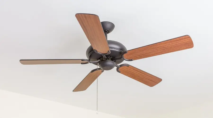 Modern ceiling fan installation improving air circulation and enhancing living spaces