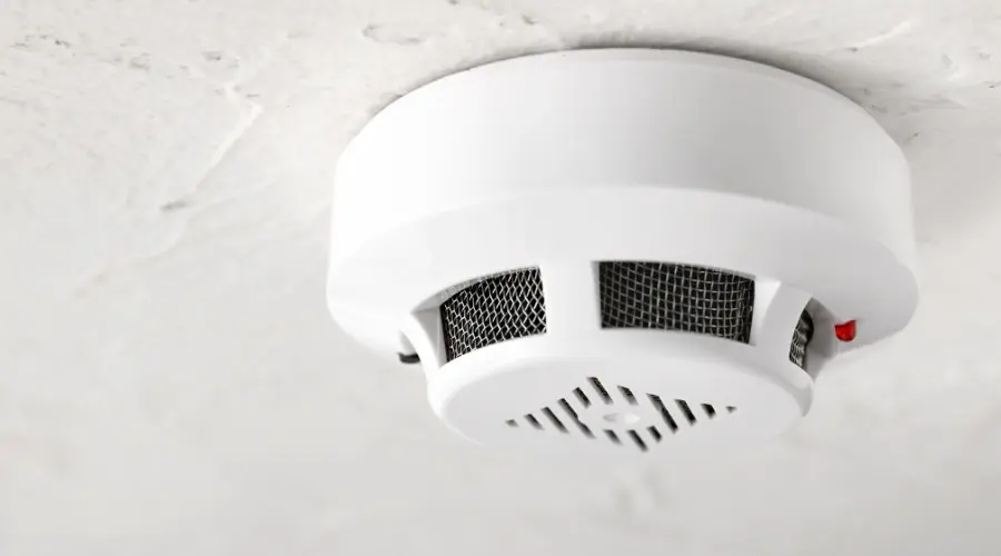 Smoke detector installed on ceiling for home fire safety
