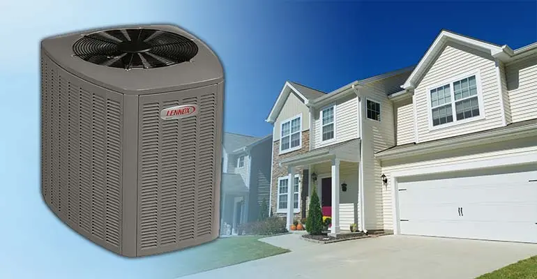 Air conditioning unit in front of a modern home, showcasing efficient cooling solutions offered by The Meridian Company for residents in Lansing and East Lansing.