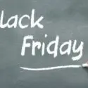 Black Friday promotional chalkboard sign showcasing home service deals from The Meridian Company.