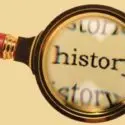 Magnifying glass over the word "history," highlighting The Meridian Company's home maintenance tips.