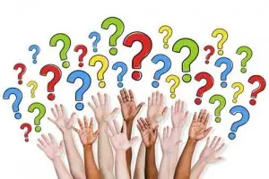 Hands raised with colorful question marks, symbolizing customer inquiries about HVAC systems and home maintenance solutions.