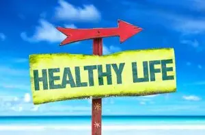 Healthy life signpost pointing towards wellness, symbolizing home maintenance and improvement for a better living environment.