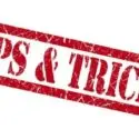 Bold red text reading "TIPS & TRICKS" on a white background for HVAC efficiency guidance by City Plumbing services.