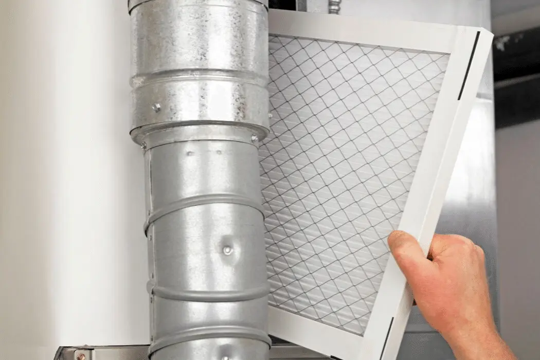 Changing an air filter in an air conditioner