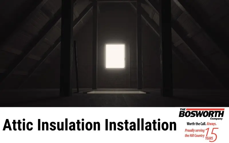 Attic interior with a window, emphasizing attic insulation installation by The Bosworth Company.