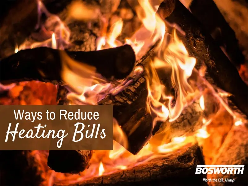 Firewood burning in a cozy fireplace with text overlay "Ways to Reduce Heating Bills," featuring Bosworth logo, emphasizing winter heating tips for homeowners.