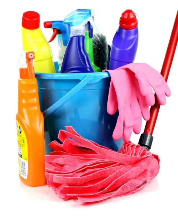 Cleaning supplies including spray bottles, gloves, and a mop in a blue bucket, representing spring cleaning for home maintenance and plumbing care.