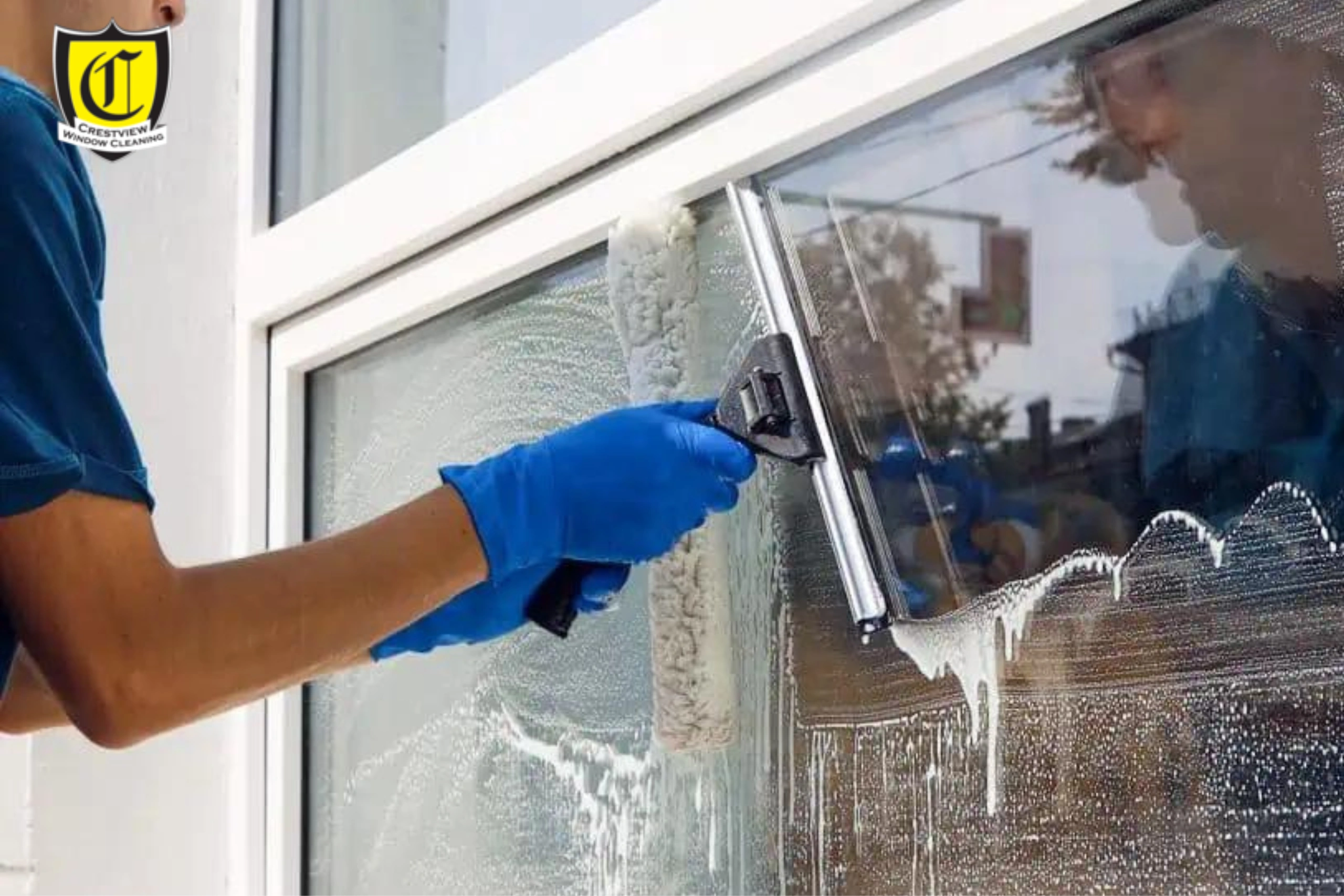 Sprinkler overspray and masonry runoff causing hard water spots on Portland windows