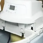 Water softener unit with control panel, illustrating home water treatment for improved plumbing and personal comfort.