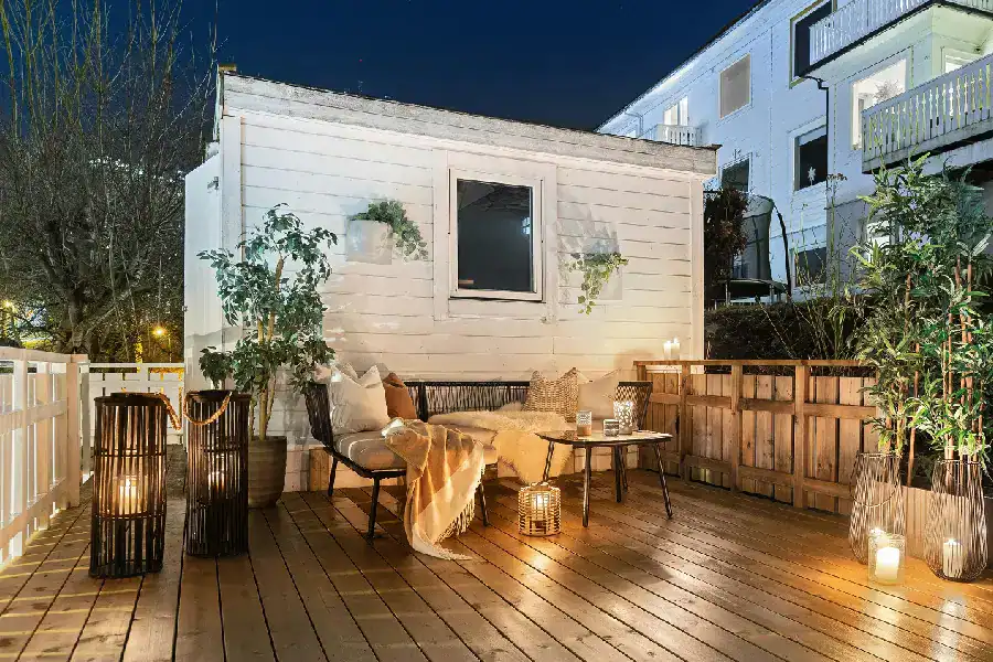 Outdoor deck with seating and backyard living area