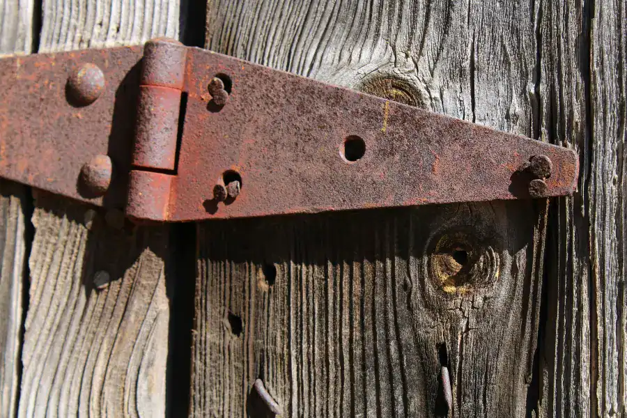 old rusty gate hinge