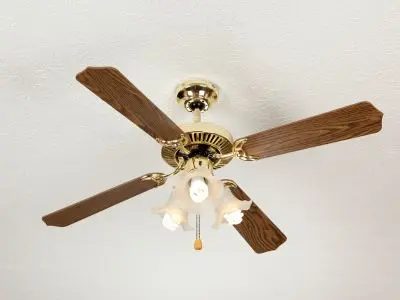 Ceiling fan with wooden blades and light fixture, illustrating energy-efficient cooling and heating strategies for improved indoor comfort and reduced HVAC costs.
